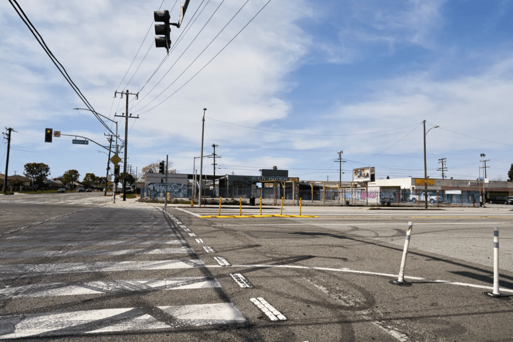 Safety barriers added to a crosswalk in Los Angeles have been damaged and hit by passing cars.